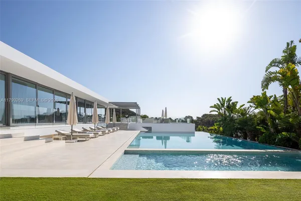 a view of a house with swimming pool