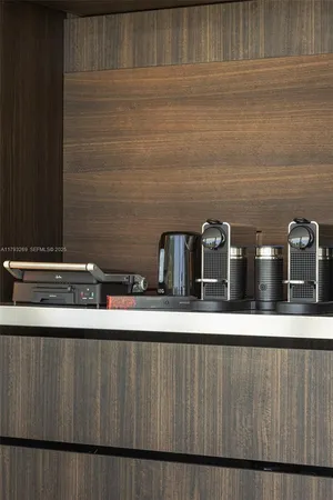 a bedroom with a large bed and a large window