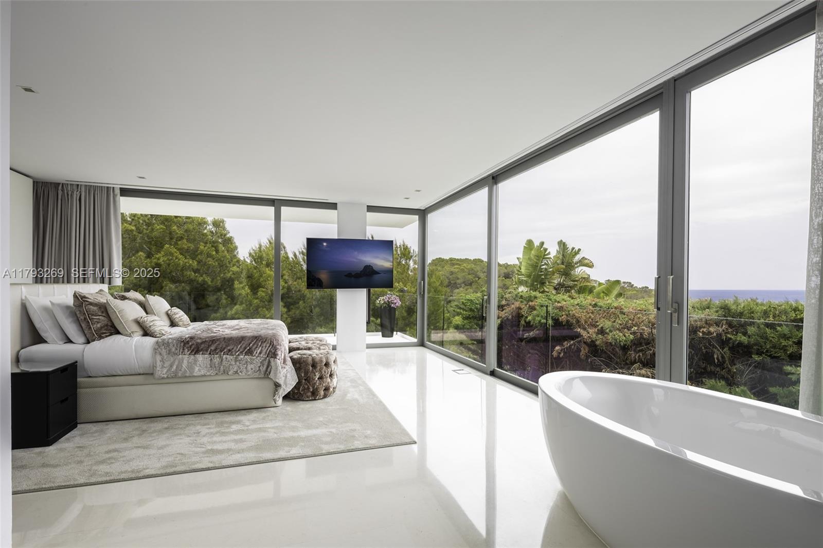 North Cathedral City undefined, FL 00000 - Photo 34 of 70 a living room with furniture a large window and a fountain