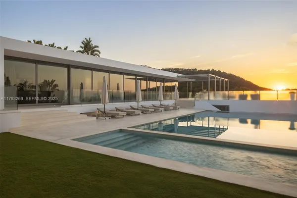 swimming pool view with seating space