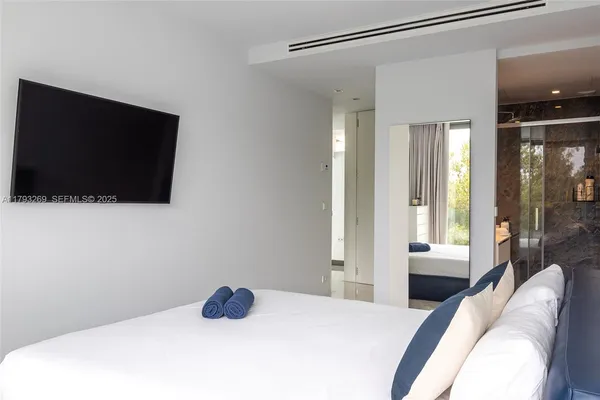 a view of storage and utility room with washer and dryer