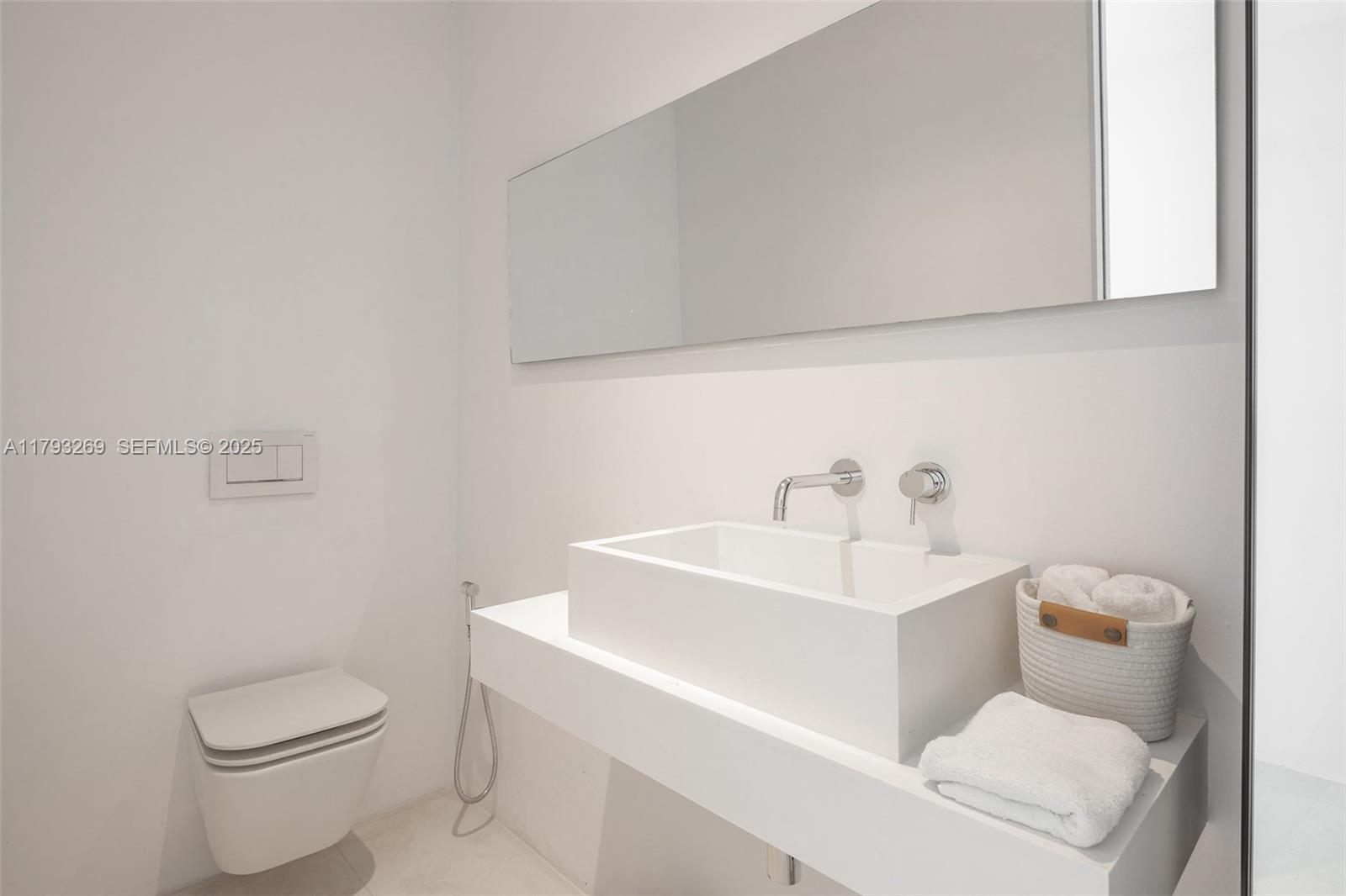 North Cathedral City undefined, FL 00000 - Photo 50 of 70 a white toilet sitting next to a bathroom sink