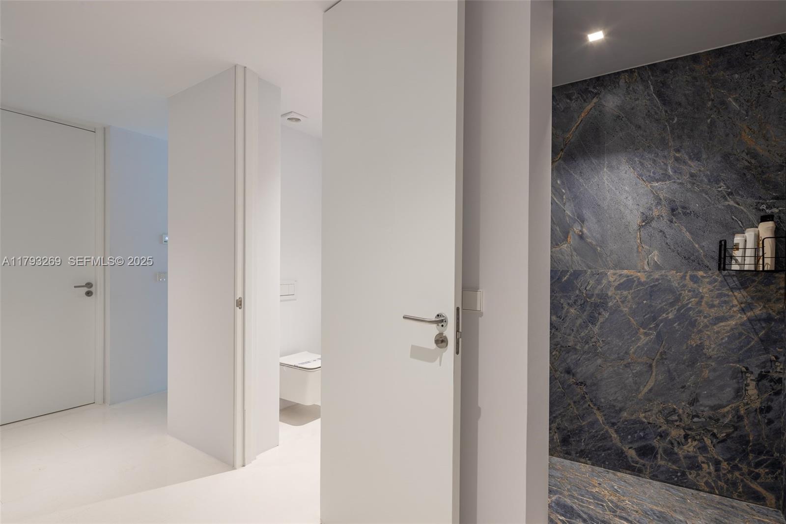 North Cathedral City undefined, FL 00000 - Photo 52 of 70 a bathroom with a granite countertop shower and a toilet