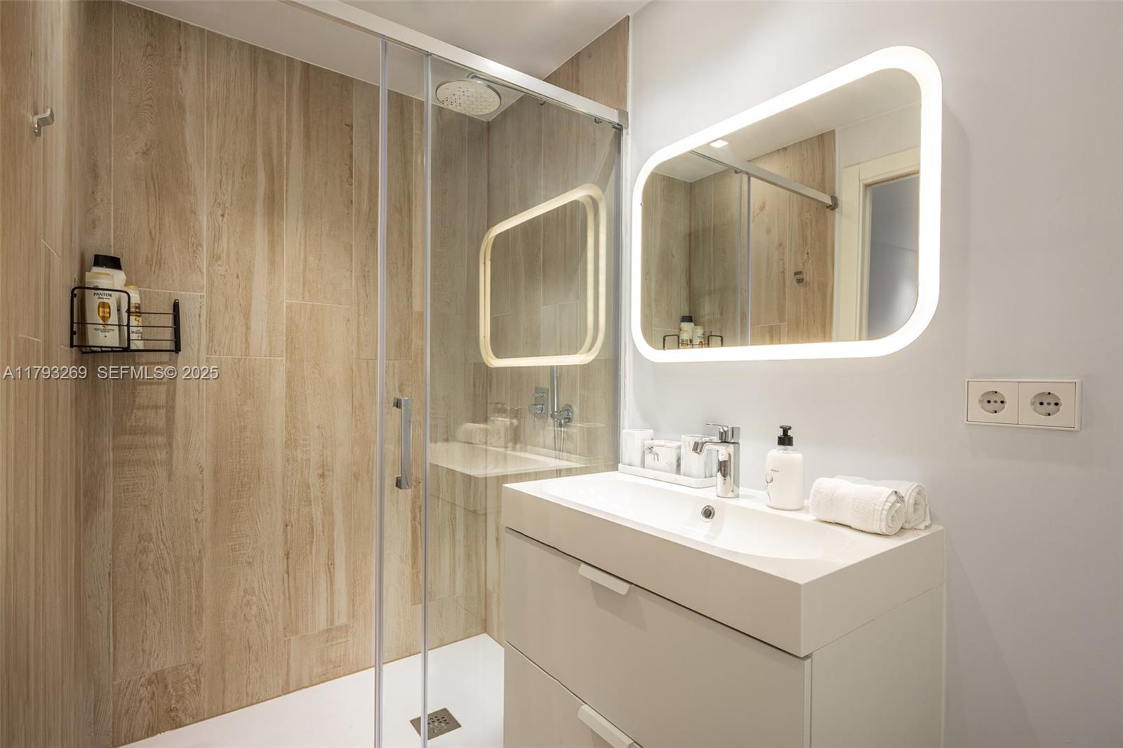 North Cathedral City undefined, FL 00000 - Photo 54 of 70 a bathroom with a sink and a mirror