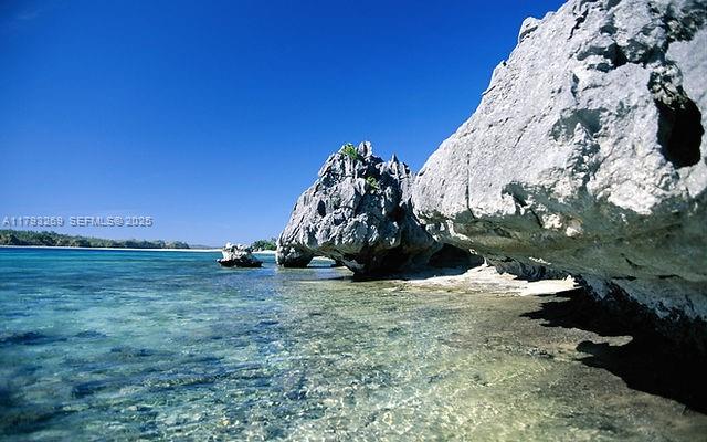 North Cathedral City undefined, FL 00000 - Photo 64 of 70 a view of a wooden fence and trees in the background