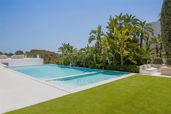 a view of a street with a building in the background