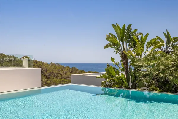 a view of swimming pool with a yard