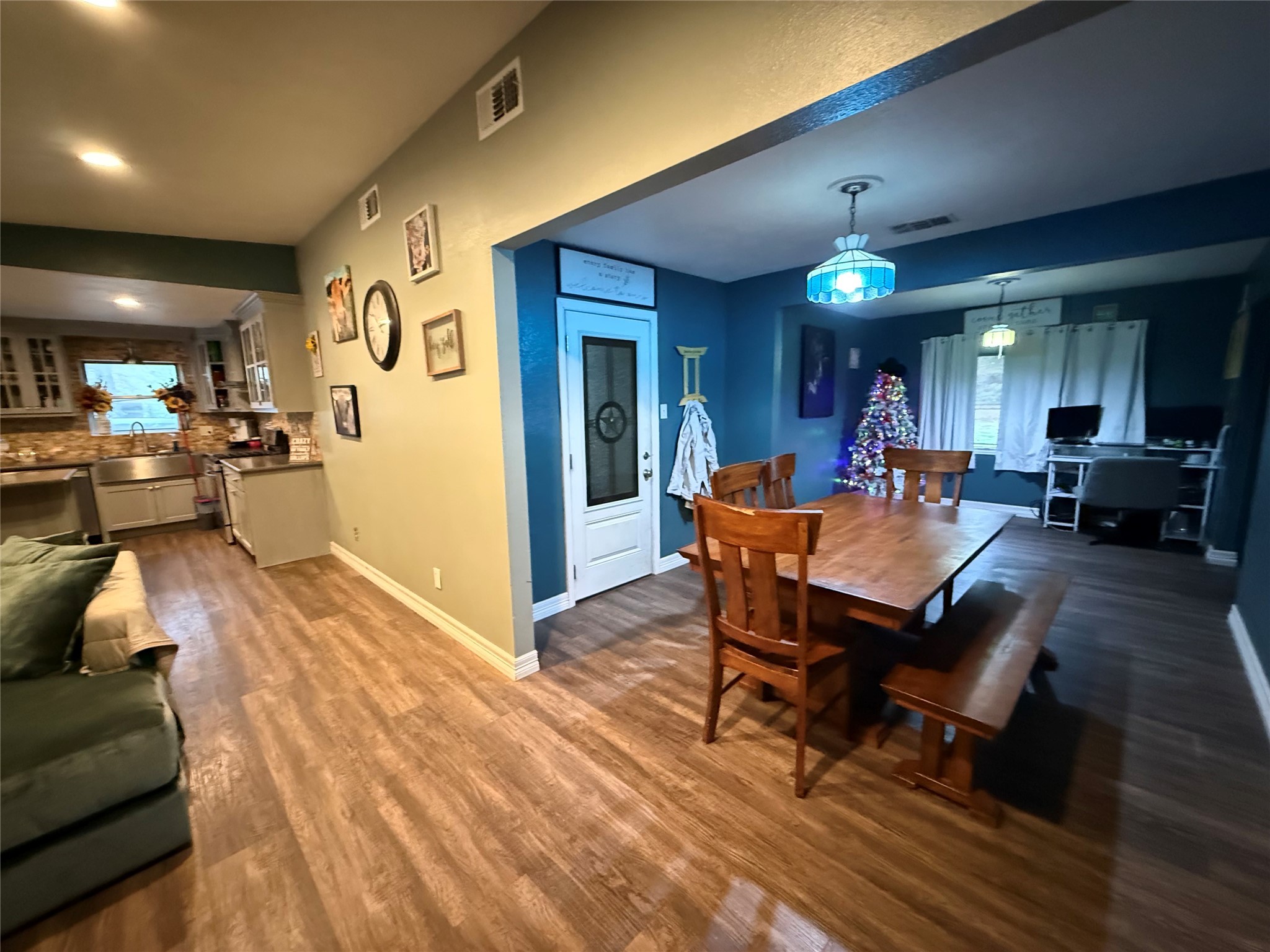 29014 Geneva Drive Spring, TX 77386 - Photo 7 of 14 a living room with furniture and a wooden floor
