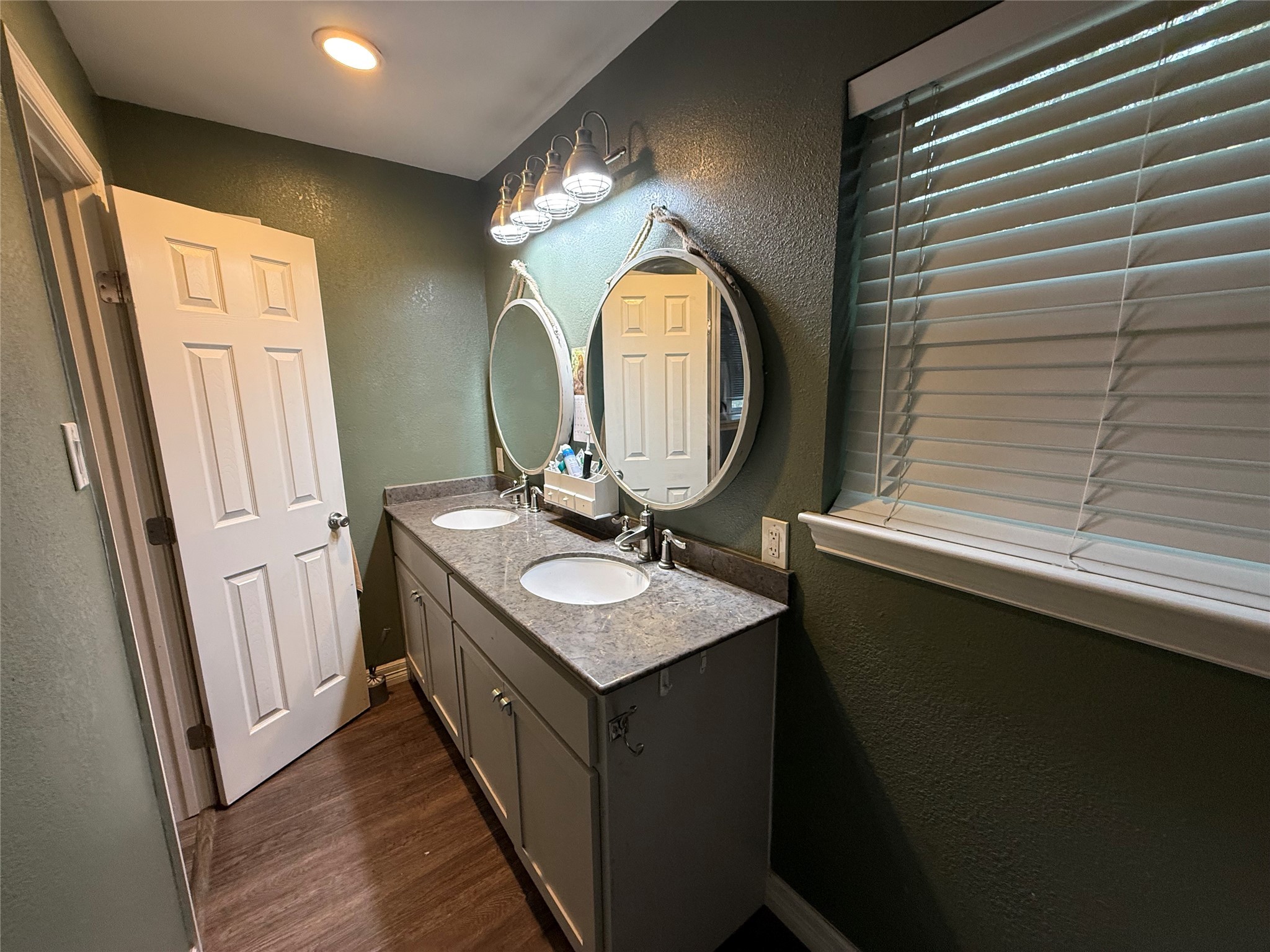 29014 Geneva Drive Spring, TX 77386 - Photo 10 of 14 a bathroom with a sink and a mirror