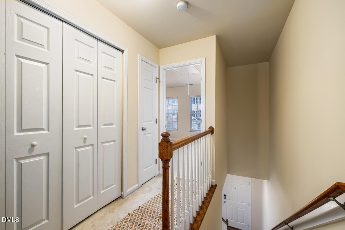 1619 Snow Mass Way Durham, NC 27713 - Photo 12 of 16 a view of a hallway with wooden floor and entryway
