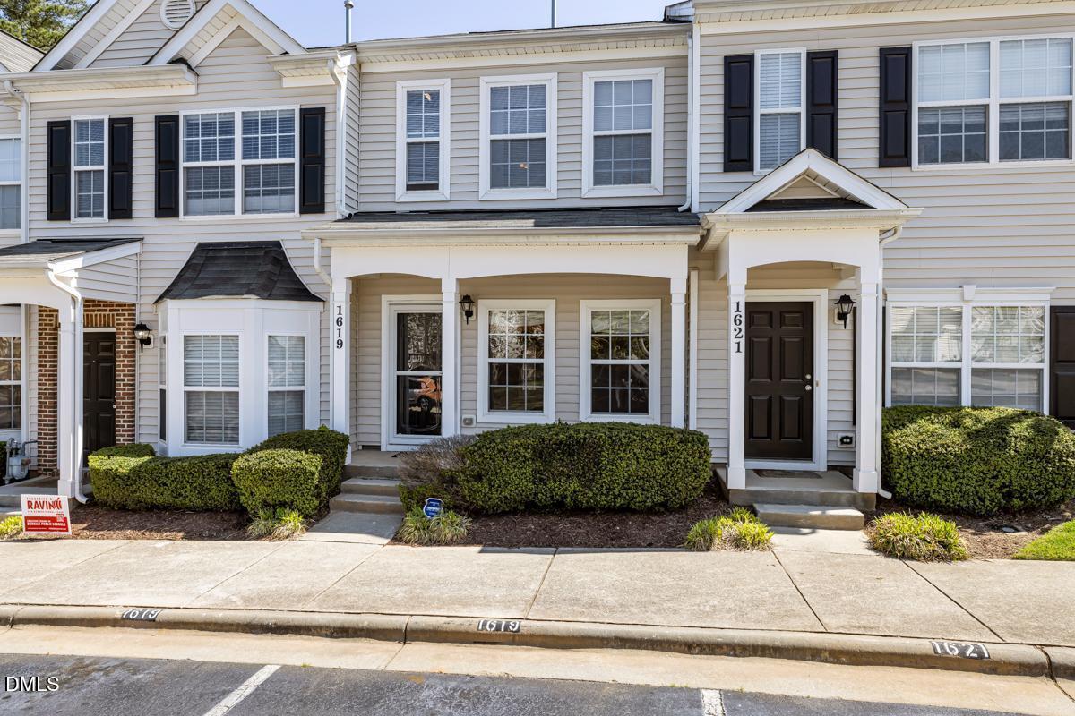 1619 Snow Mass Way Durham, NC 27713 - Photo 2 of 16 a front view of a house having yard