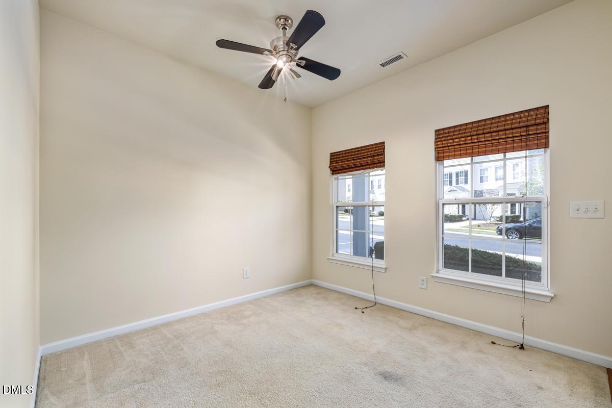 1619 Snow Mass Way Durham, NC 27713 - Photo 8 of 16 an empty room with a empty space and windows