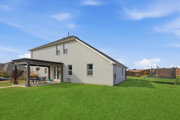 a front view of house with yard