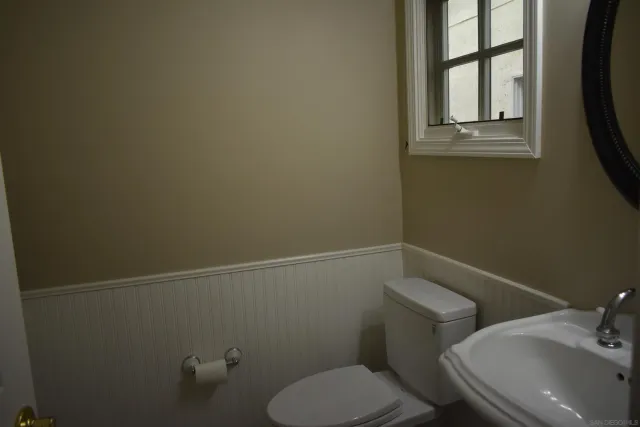 a bathroom with a toilet