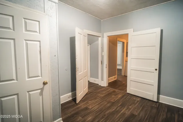 a view of entryway with wooden floor
