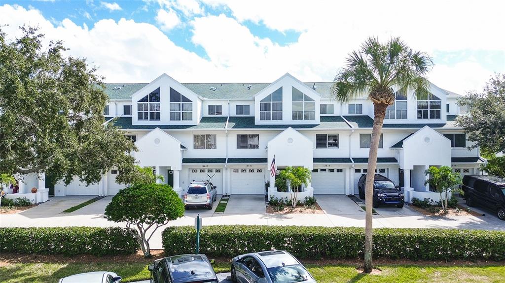 14859 Seminole Trail Seminole, FL 33776 - Photo 1 of 56 a front view of a house with garden