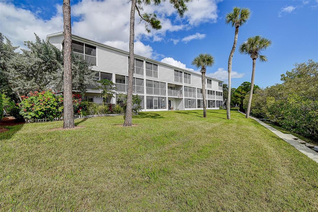 14859 Seminole Trail Seminole, FL 33776 - Photo 40 of 56 a view of a house with a yard