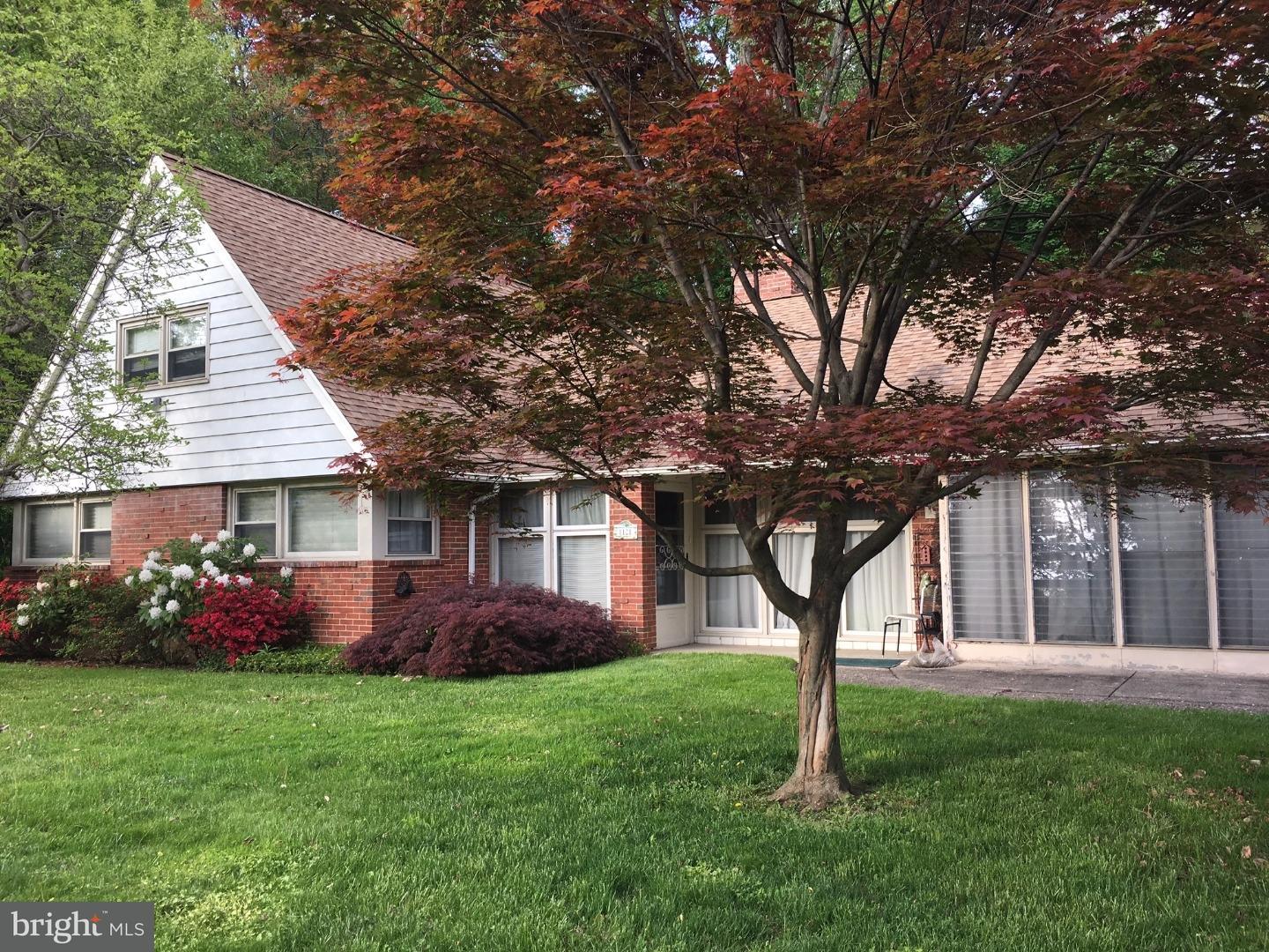 1121 Delene Road Jenkintown, PA 19046 - Photo 1 of 6 front view of house with a yard