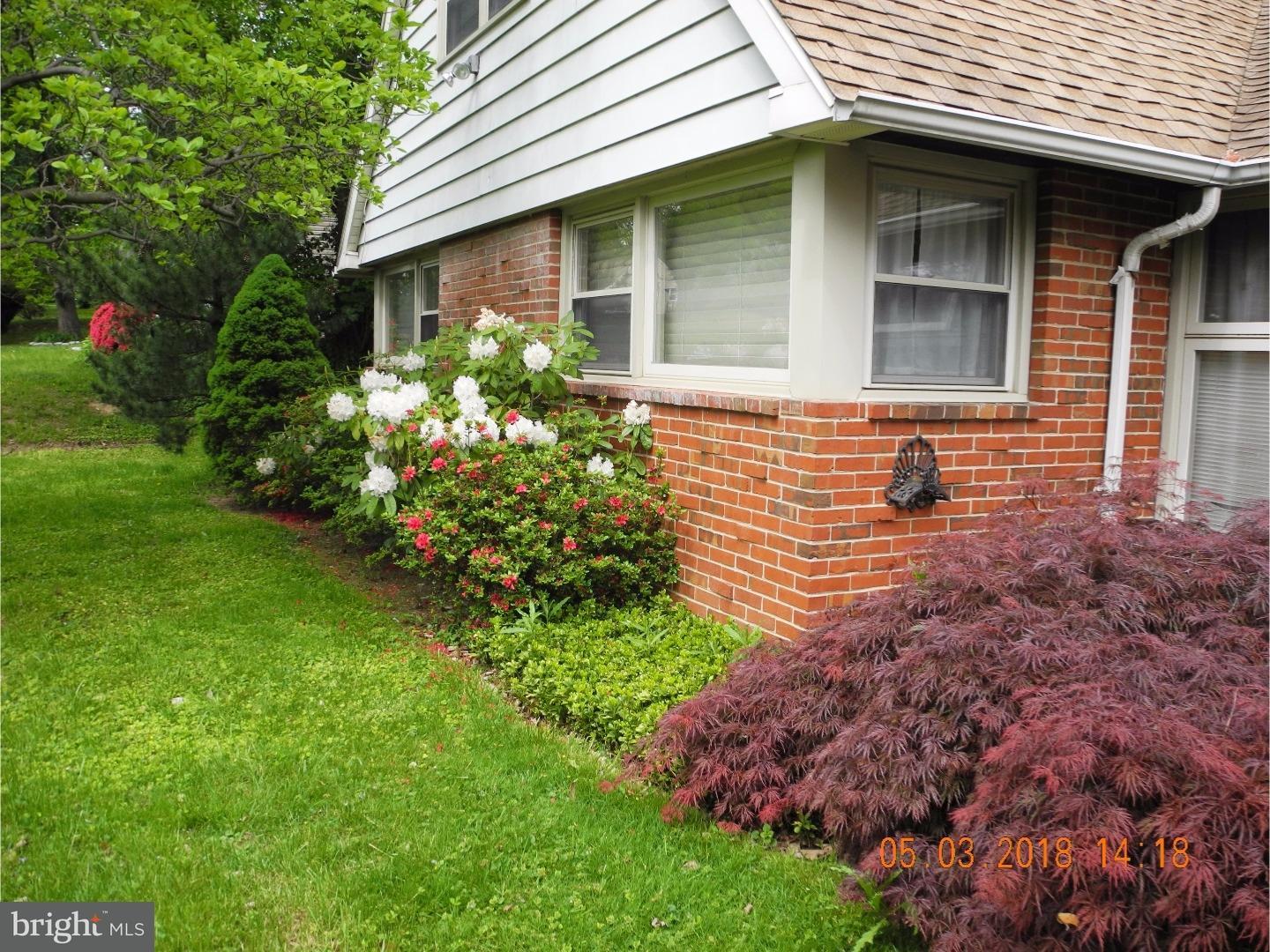 1121 Delene Road Jenkintown, PA 19046 - Photo 5 of 6 a view of a house with a yard