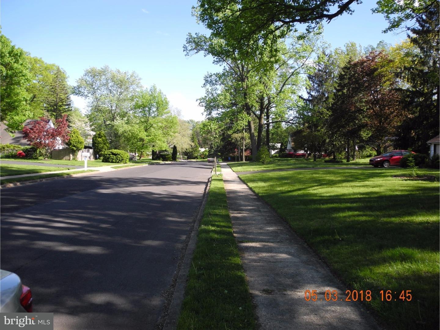 1121 Delene Road Jenkintown, PA 19046 - Photo 6 of 6 a big yard with trees in the background