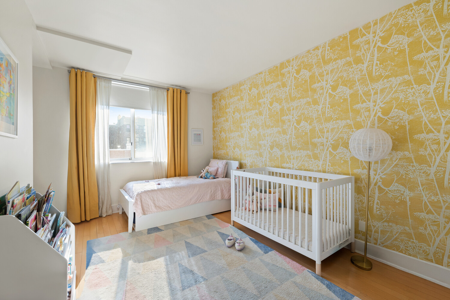 63 Conselyea Street, Unit A4 Brooklyn, NY 11211 - Photo 6 of 18 a bedroom with a bed and a window