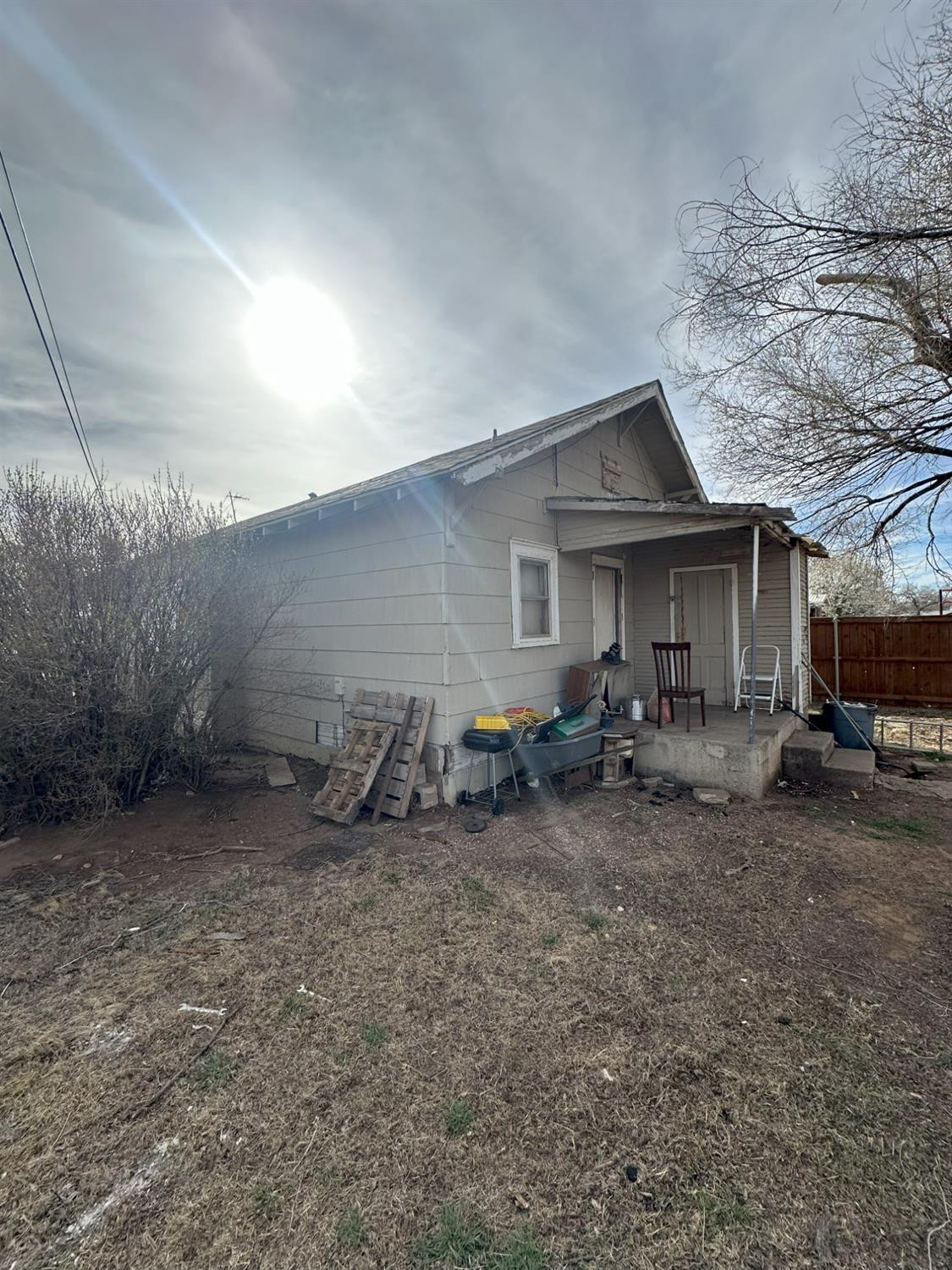 115 Yonkers Street Plainview, TX 79072 - Photo 8 of 20 a view of a house with yard and sitting area