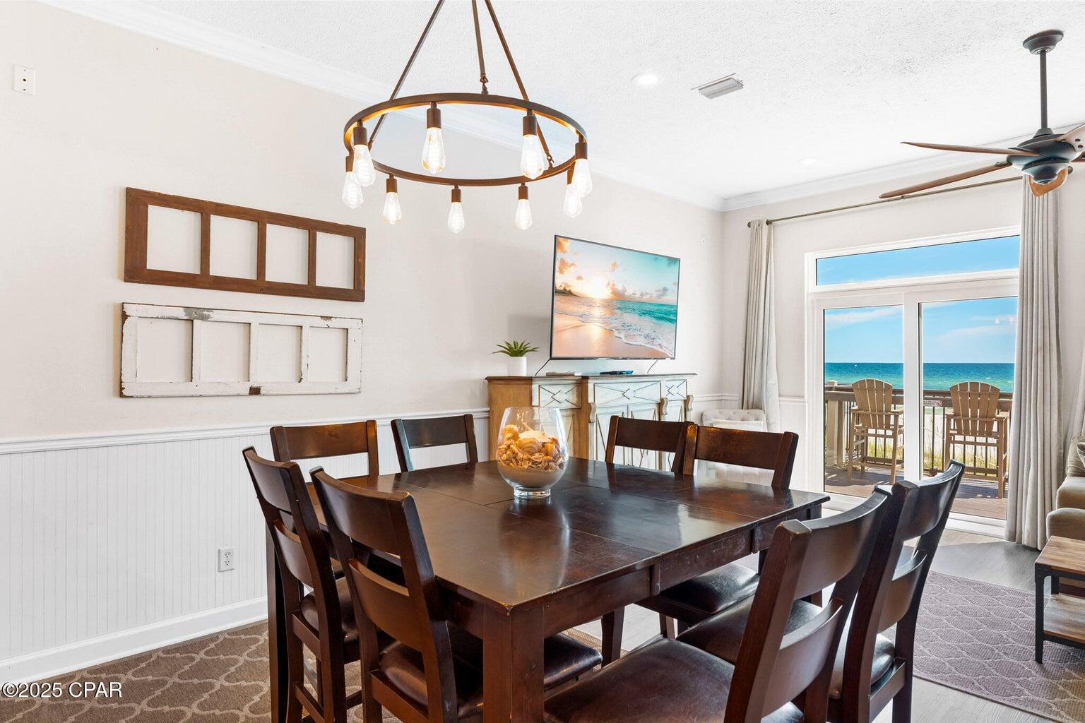 17657 Front Beach Road, Unit B Panama City Beach, FL 32413 - Photo 13 of 34 a view of a dining room with furniture window and outside view