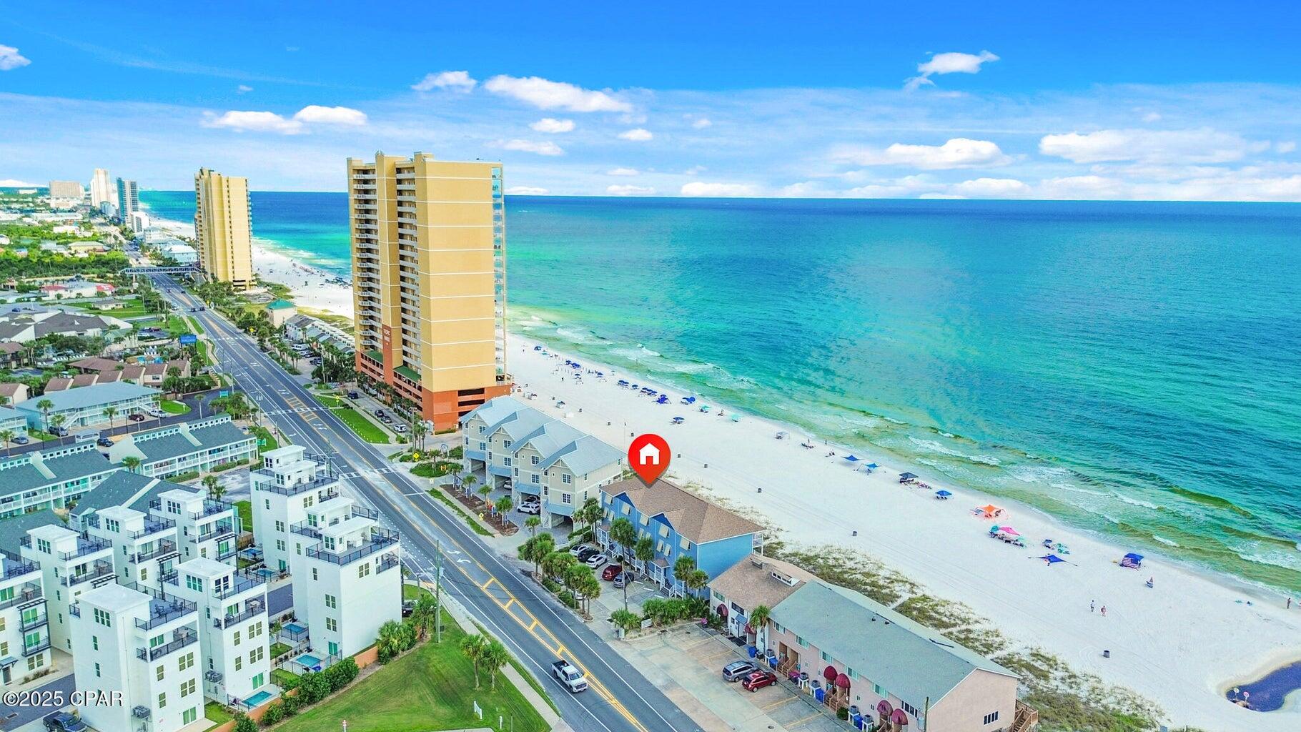 17657 Front Beach Road, Unit B Panama City Beach, FL 32413 - Photo 3 of 34 a city view with tall buildings
