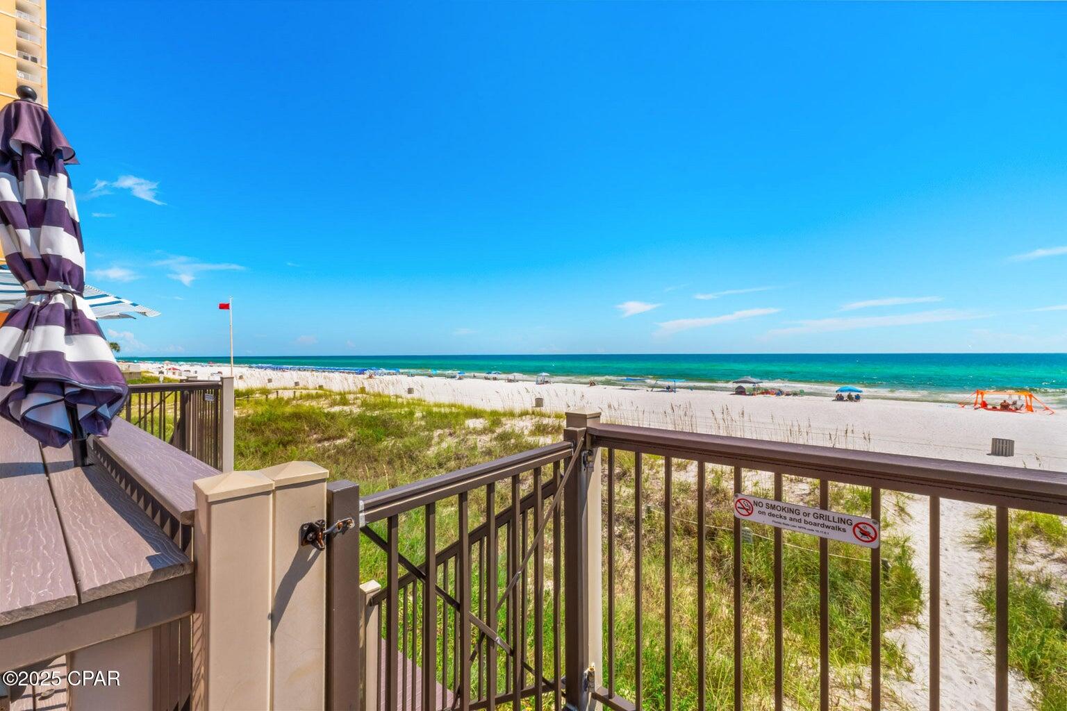 17657 Front Beach Road, Unit B Panama City Beach, FL 32413 - Photo 5 of 34 a view of swimming pool from a balcony