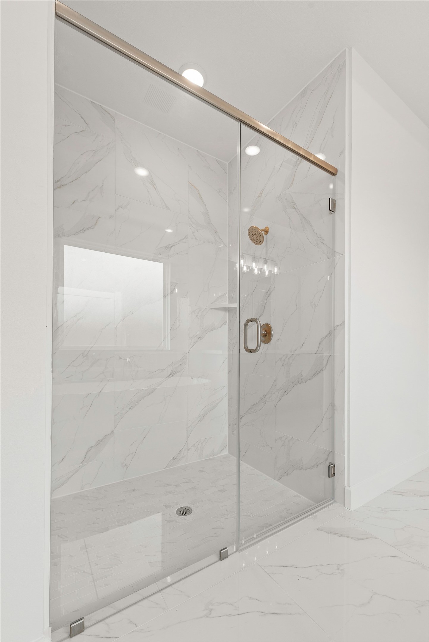 5615 Sandcastle Rdg Drive Katy, TX 77493 - Photo 12 of 27 a bathroom with a glass shower door