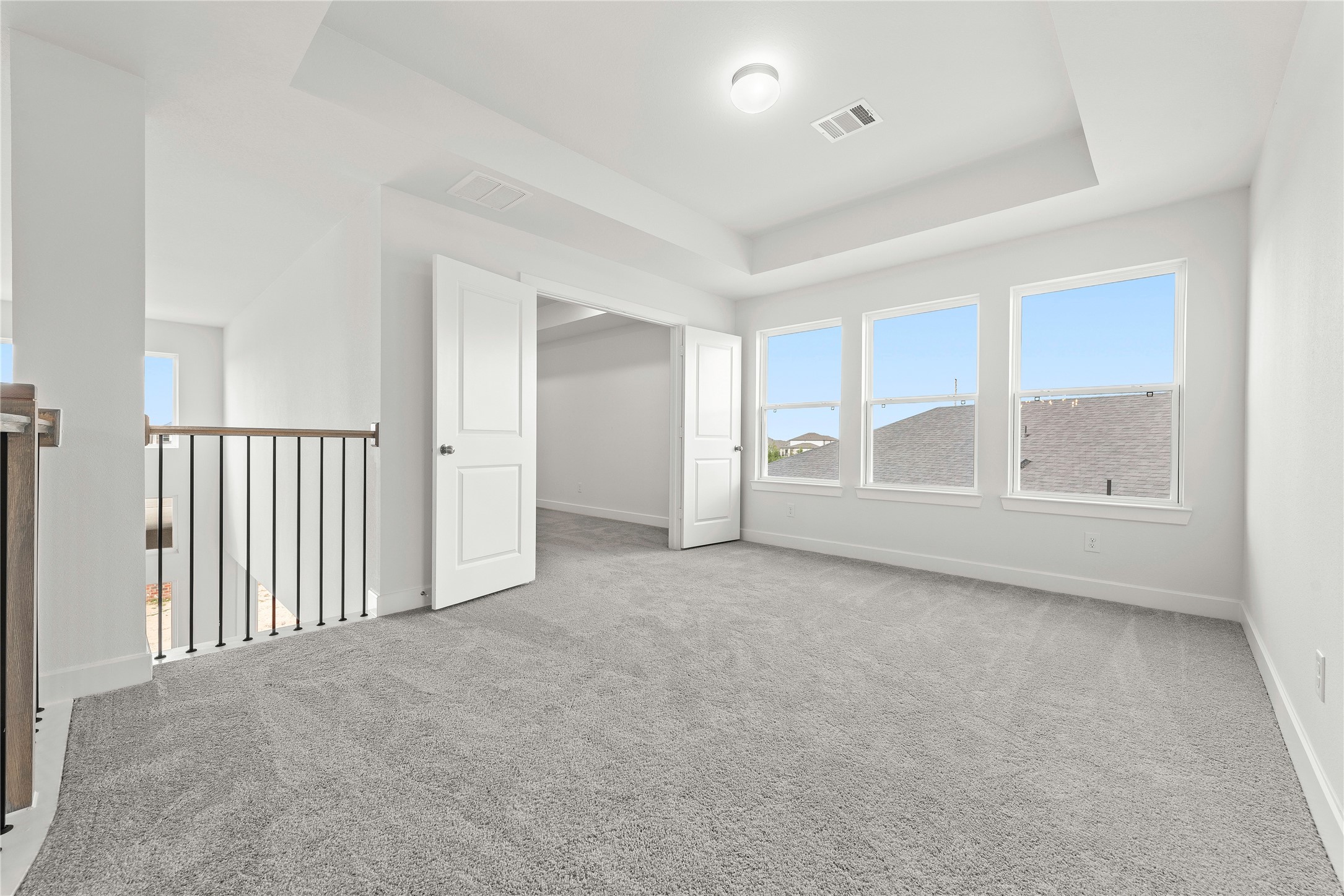 5615 Sandcastle Rdg Drive Katy, TX 77493 - Photo 16 of 27 an empty room with windows
