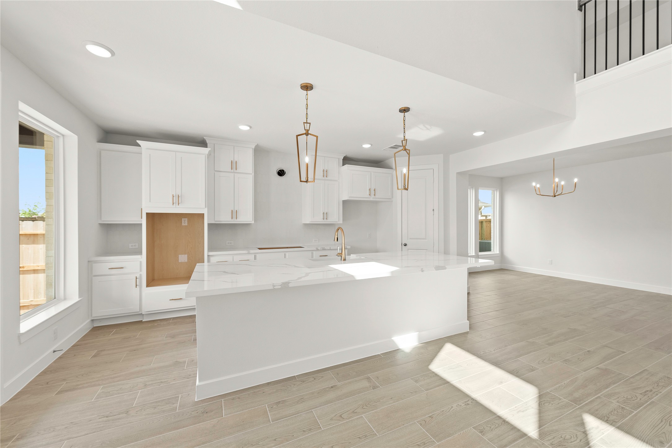 5615 Sandcastle Rdg Drive Katy, TX 77493 - Photo 6 of 27 a large kitchen with a lot of counter space and a sink