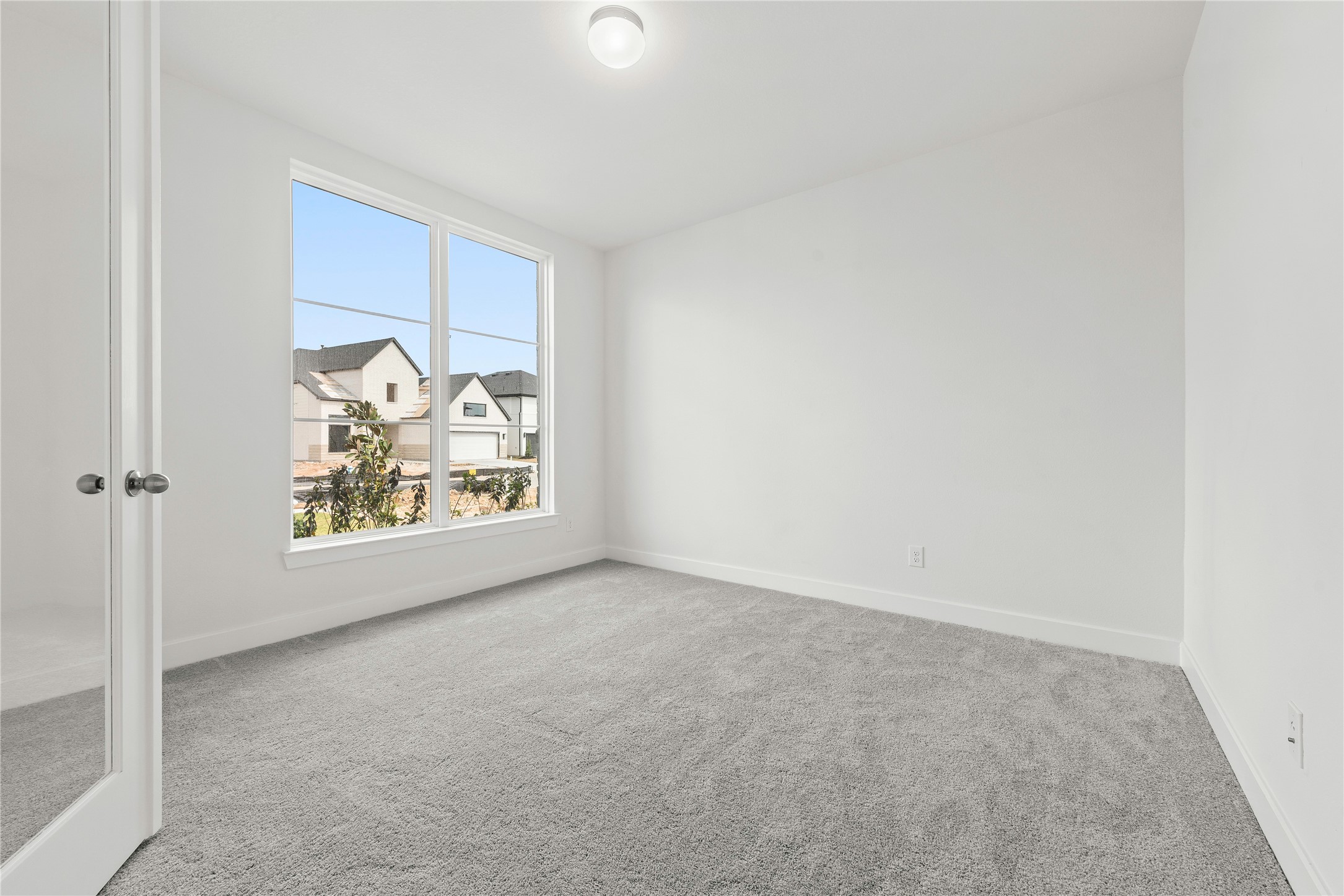 5615 Sandcastle Rdg Drive Katy, TX 77493 - Photo 8 of 27 an empty room with window
