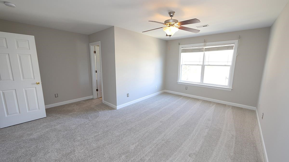 2023 Fieldhouse Avenue Raleigh, NC 27603 - Photo 8 of 13 Master Bedroom