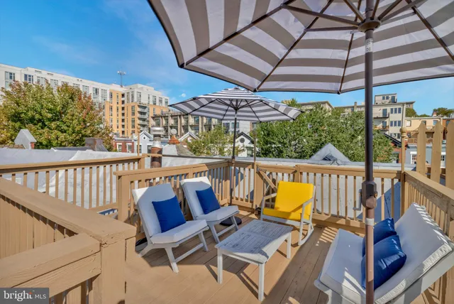 a view of a chairs and table in the patio