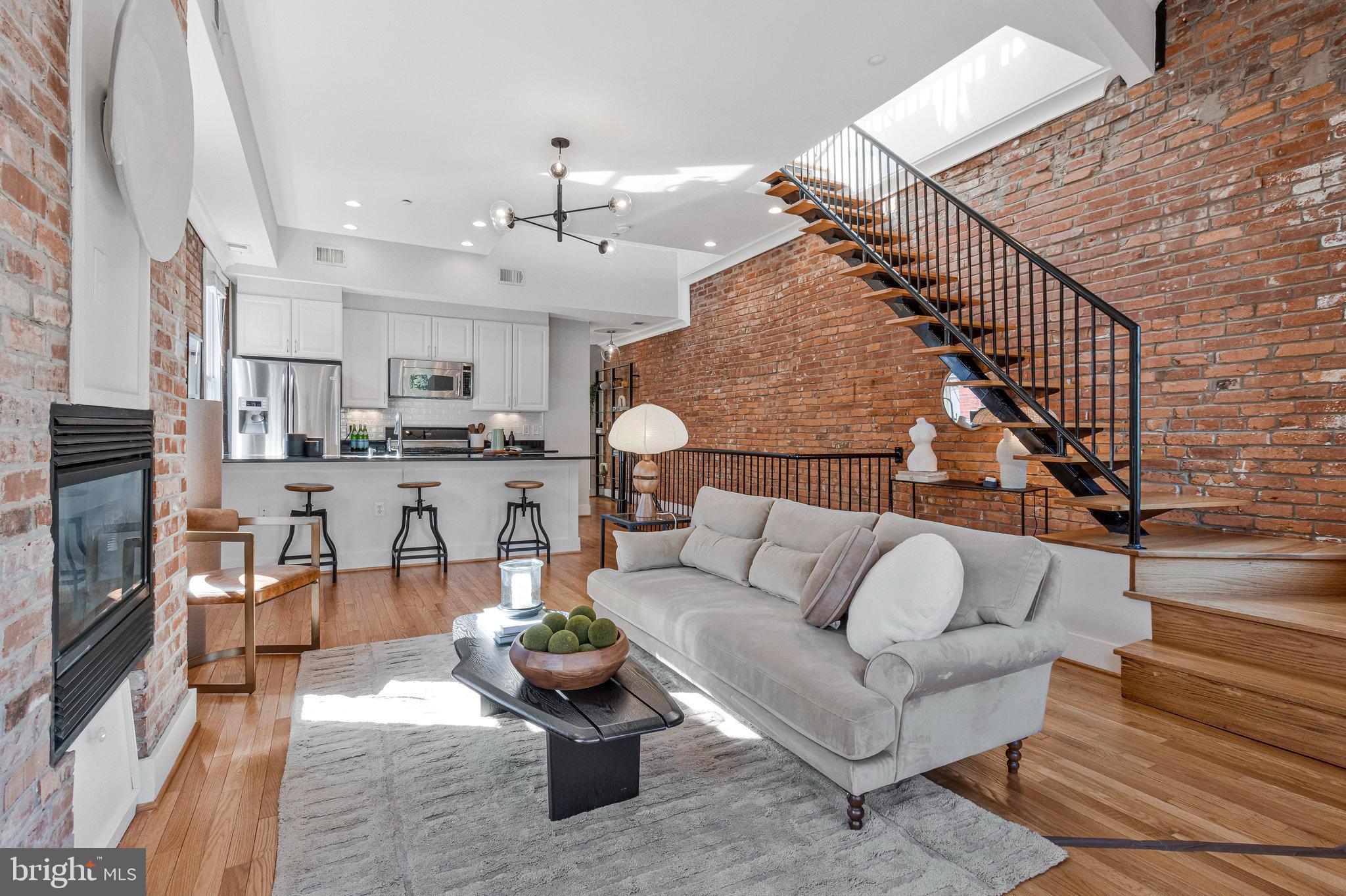 1312 Florida Avenue Northwest, Unit 3 Washington, DC 20009 - Photo 4 of 18 a living room with furniture and kitchen view