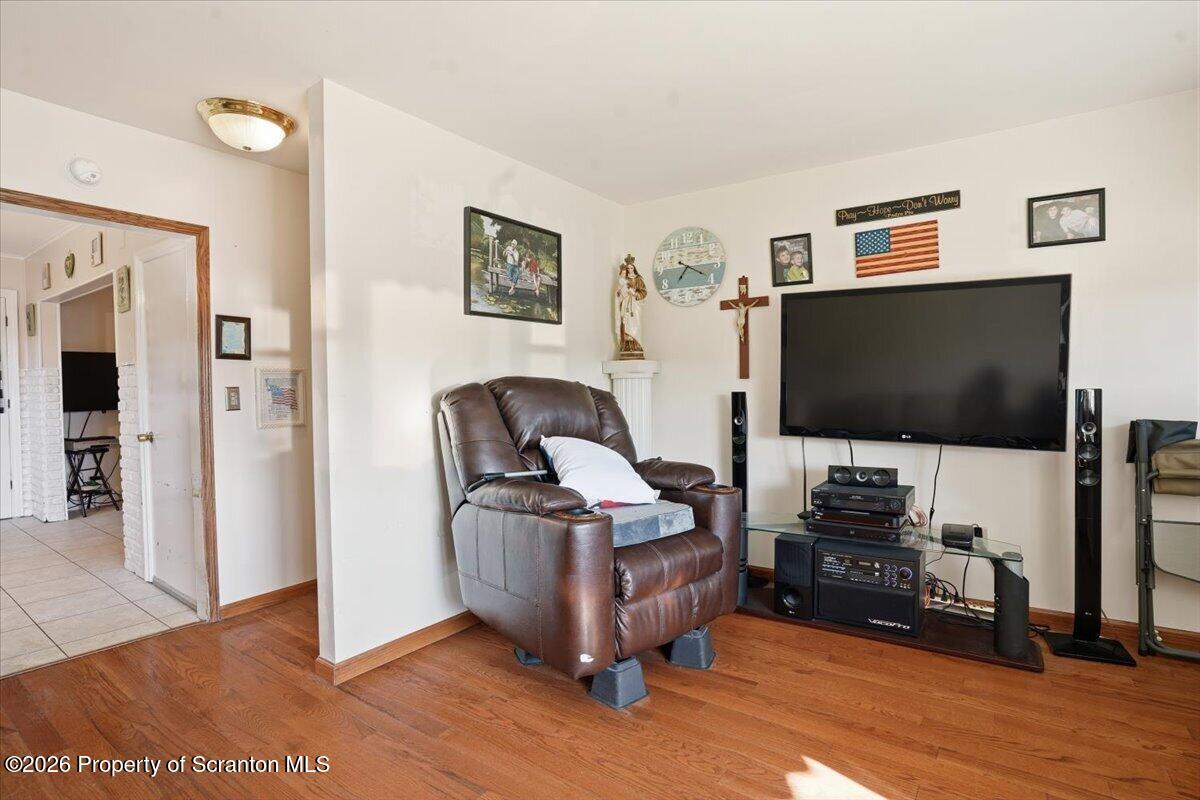 101 Stone Street Moosic, PA 18507 - Photo 4 of 53 a living room with furniture and a flat screen tv