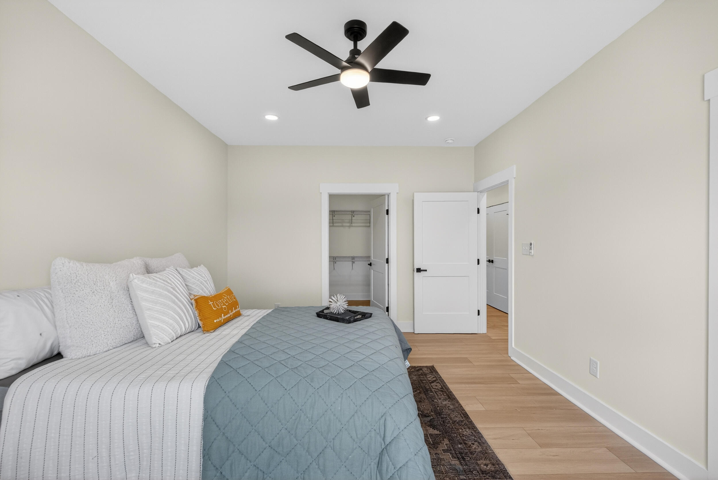 Lot 22 Rolling Road Moneta, VA 24121 - Photo 20 of 45 a bedroom with a bed and a chandelier