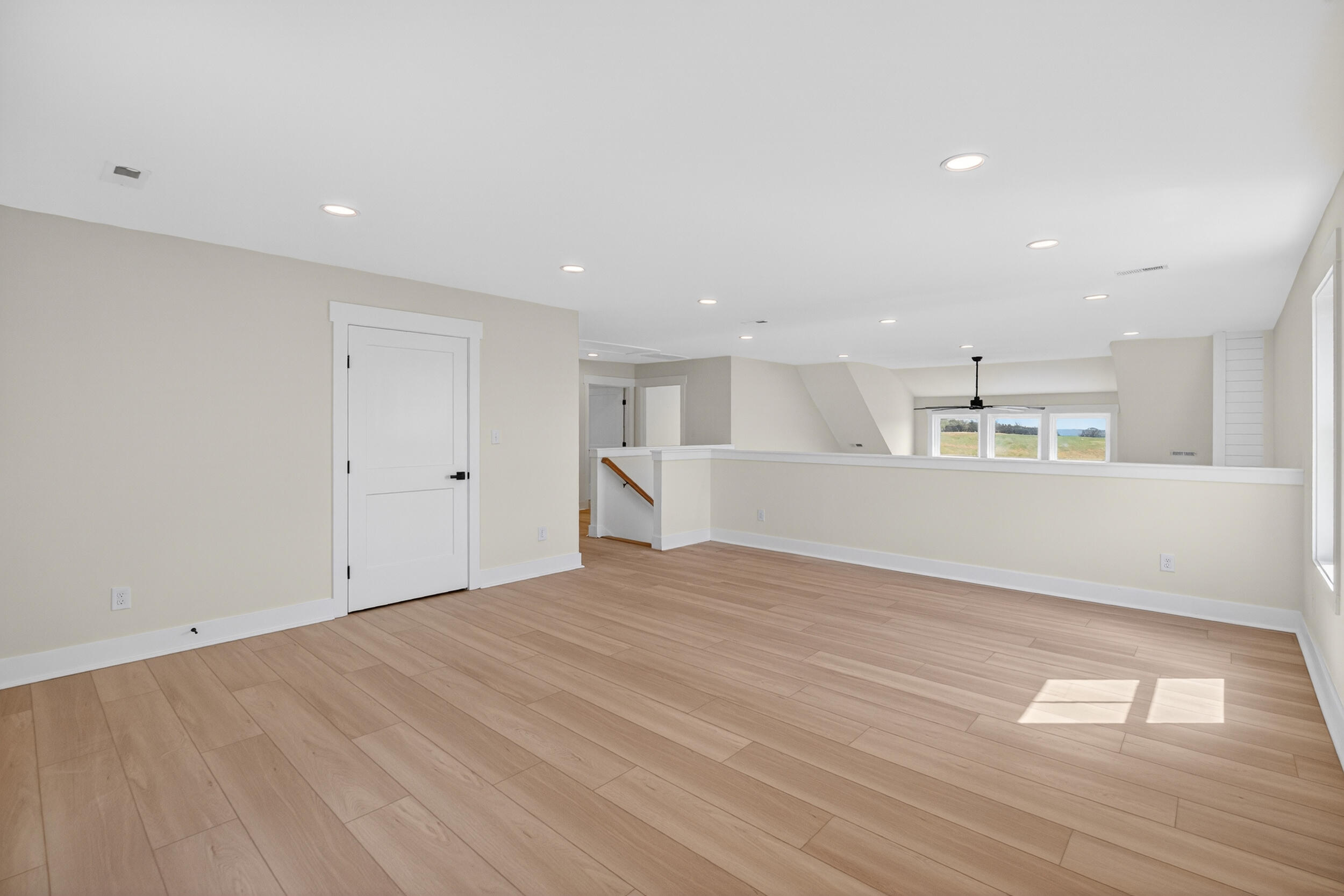 Lot 22 Rolling Road Moneta, VA 24121 - Photo 30 of 45 a view of an empty room with wooden floor and a window