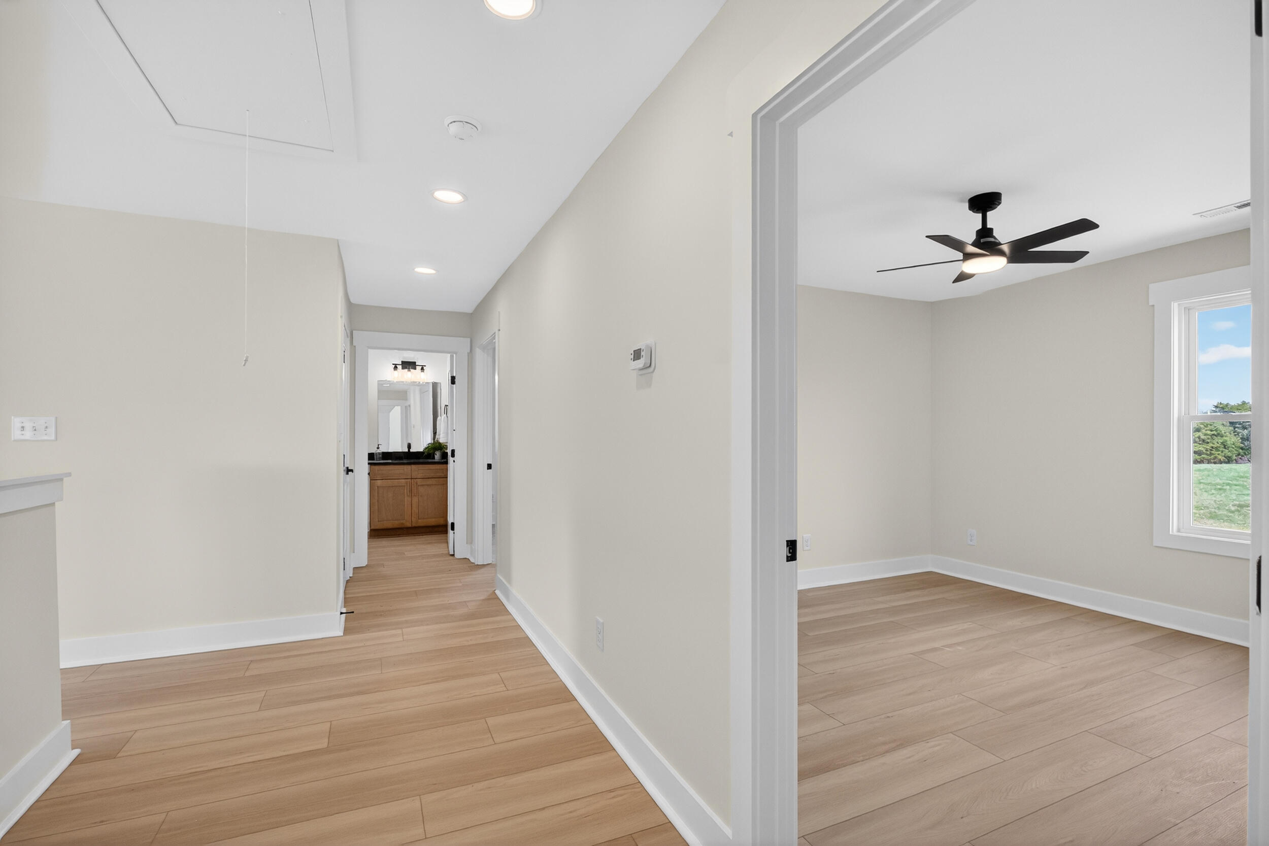 Lot 22 Rolling Road Moneta, VA 24121 - Photo 32 of 45 wooden floor in an empty room with a window