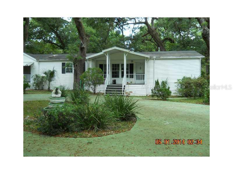 18037 Riggins Road Spring Hill, FL 34610 - Photo 1 of 1 Exterior Front