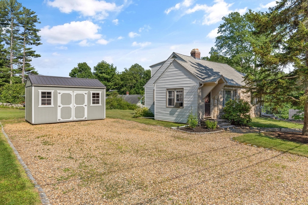 8 Harding Street Cherry Valley, MA 01611 - Photo 1 of 20 a front view of a house with a garden