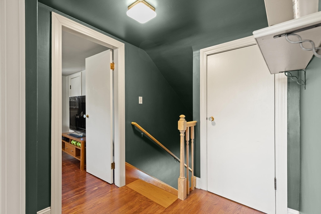 8 Harding Street Cherry Valley, MA 01611 - Photo 11 of 20 a view of a hallway with wooden floor and entryway