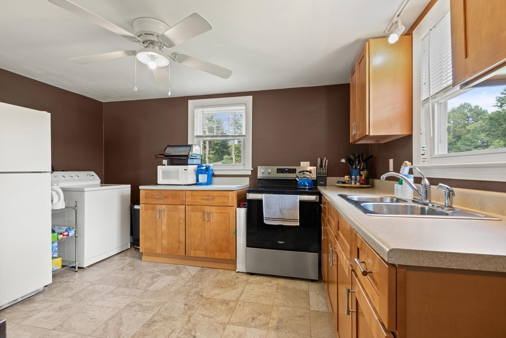 8 Harding Street Cherry Valley, MA 01611 - Photo 7 of 20 a kitchen with a sink cabinets and window
