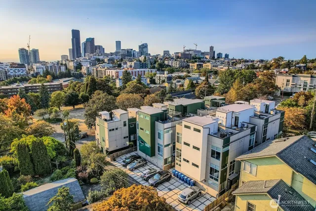 an aerial view of a city with lots of residential buildings