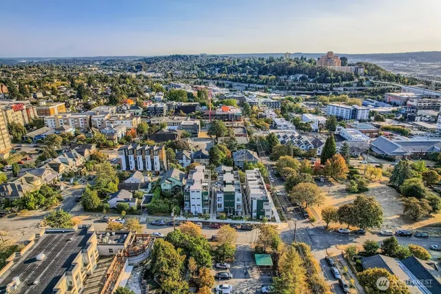 an aerial view of a city with lots of residential buildings
