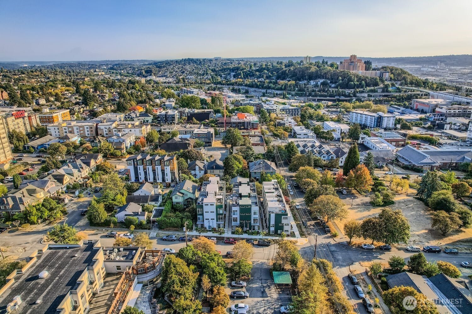 1605 South Washington Street, Unit F Seattle, WA 98144 - Photo 20 of 22 an aerial view of a city with lots of residential buildings
