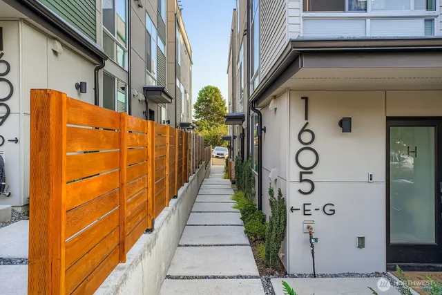 a view of a brick wall with windows