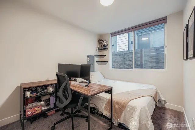 a workspace with furniture and window