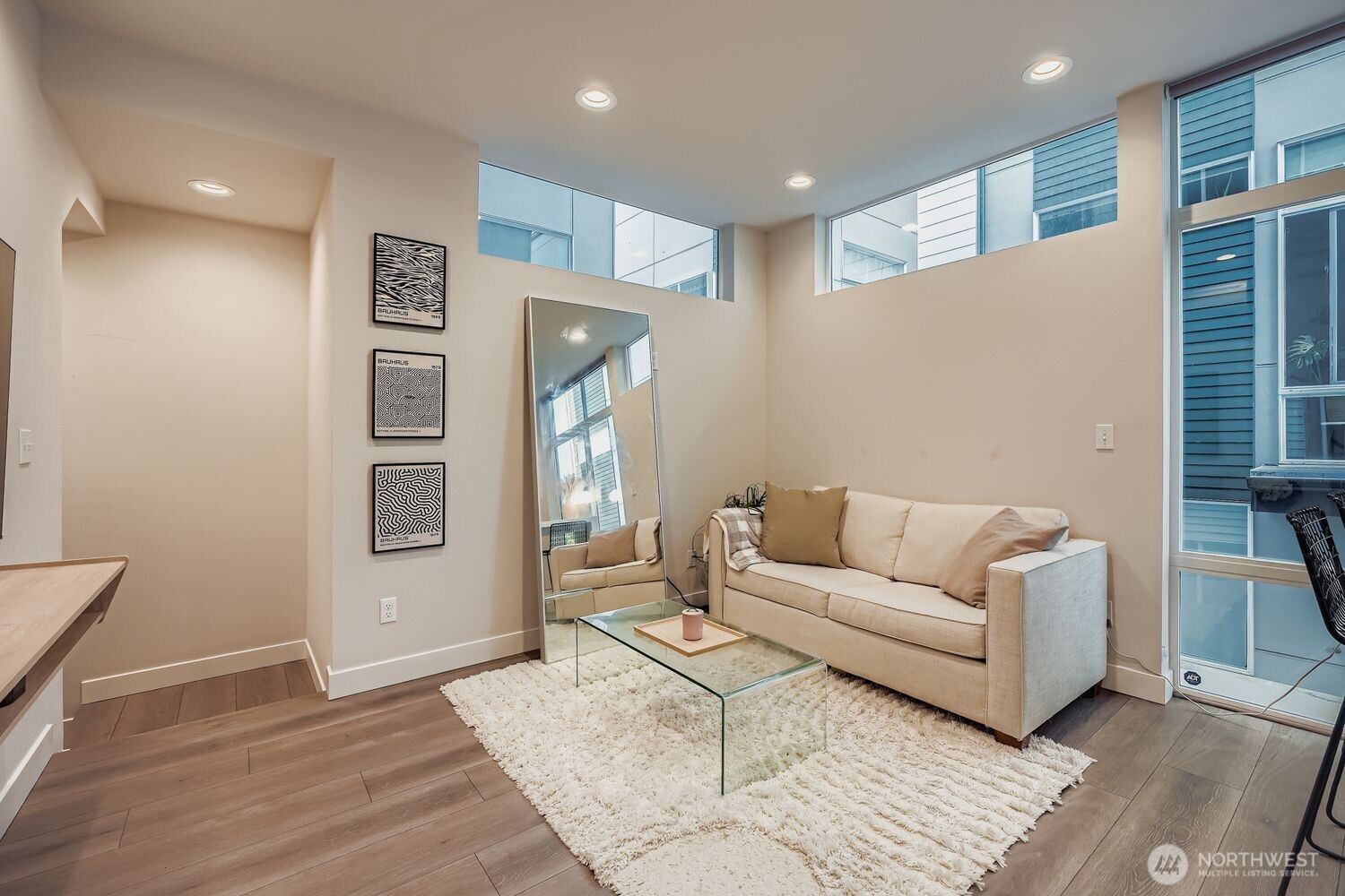 1605 South Washington Street, Unit F Seattle, WA 98144 - Photo 9 of 22 a living room with furniture and a rug